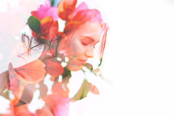 Double exposure portrait of young pretty woman with bright spring garden flowers and leaves.  - 写真・画像