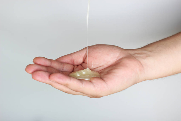 liquid soap hand on a light background - Фото, зображення
