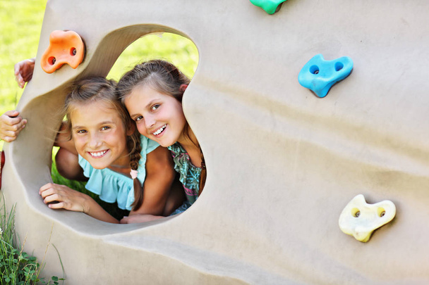 Joyful children having fun on playground - Foto, Imagen