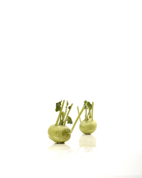 Two trimmed kohlrabi isoalted on a white background - Photo, Image