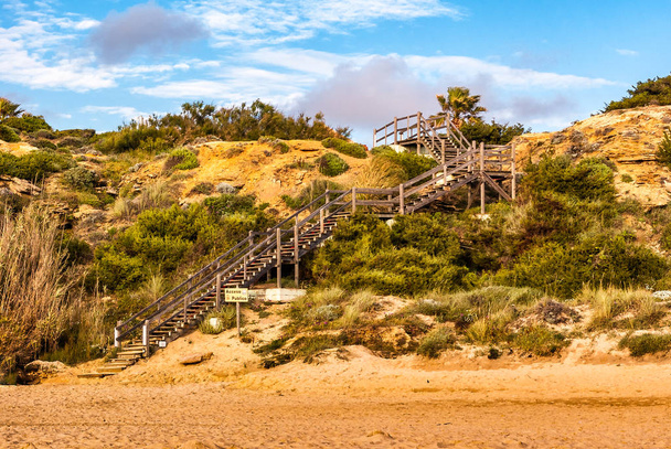 Wooden footbridge to the beach of Conil de la Frontera in Cadiz, Spain. - Photo, Image