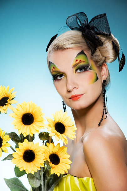 Young beauty with butterfly face-art - Photo, Image