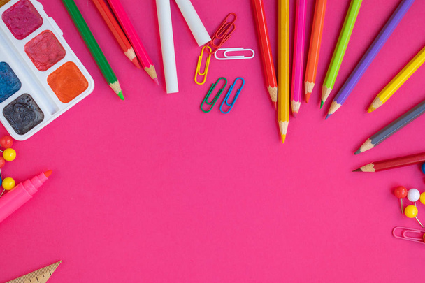 School and office supplies on pink background, back to school concept - Foto, imagen