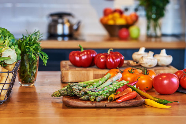 Fresh vegetables for salad on a kitchen table. - 写真・画像