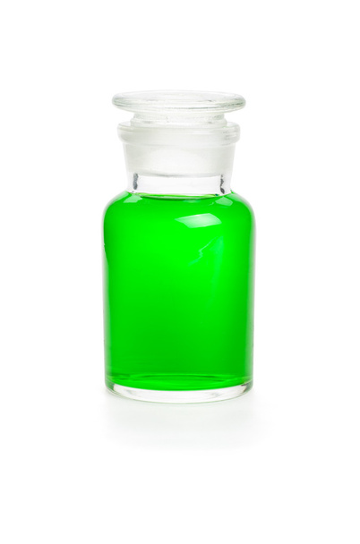 Laboratóriumi üveg tele zöld folyadék - Fotó, kép