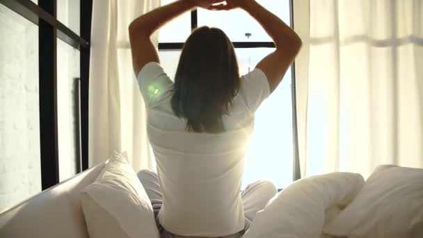 Morning Waking Up. Man Sitting On Bed And Stretching - Video, Çekim