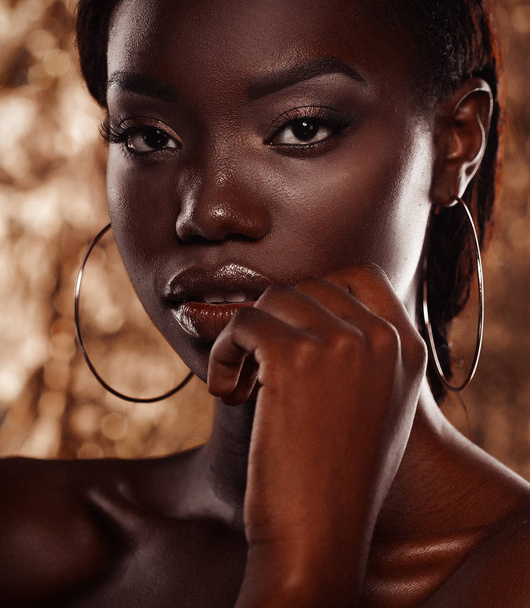 Close up portrait of beautiful african woman with creative gold make up - Фото, изображение