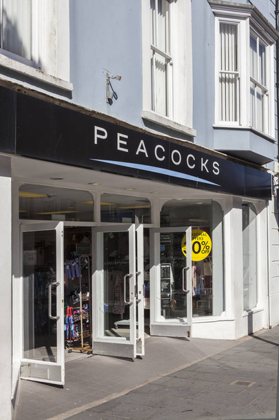 Tenby, Wales, UK, May 14, 2018 :  Peacocks clothing retail outlet which is a popular store in St Julian's Road in the city centre - Fotografie, Obrázek