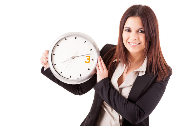 Bizneswoman trzyma zegar - Zdjęcie, obraz