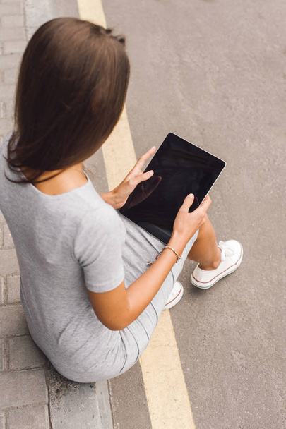 Young business woman using digital tablet - 写真・画像