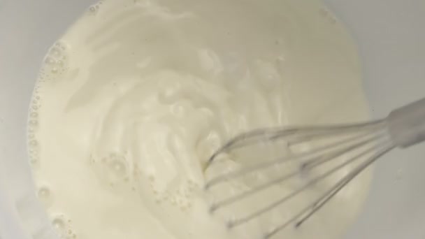 Whisking Eggs And Milk In Bowl - Felvétel, videó