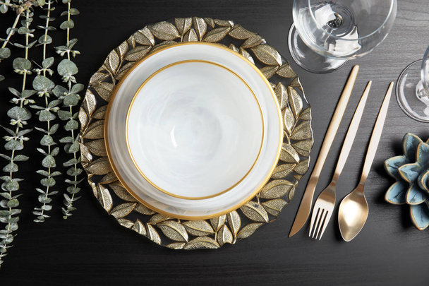 Elegant table setting on dark background, top view - Photo, Image