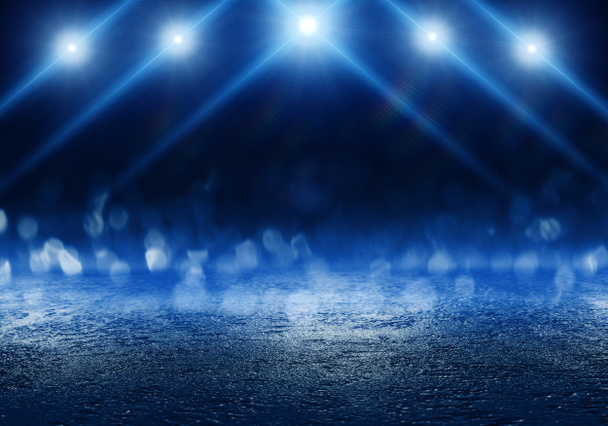 Üres jelenet egy show, lámpák és a betonon, bokeh, a fények, a sugarak absztrakt kék háttér - Fotó, kép