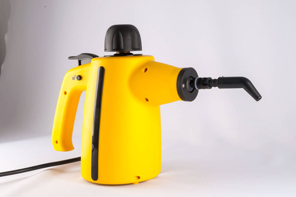 Sarı Sıcak Buhar Temizleme Makinesinin Fotoğrafı - Fotoğraf, Görsel