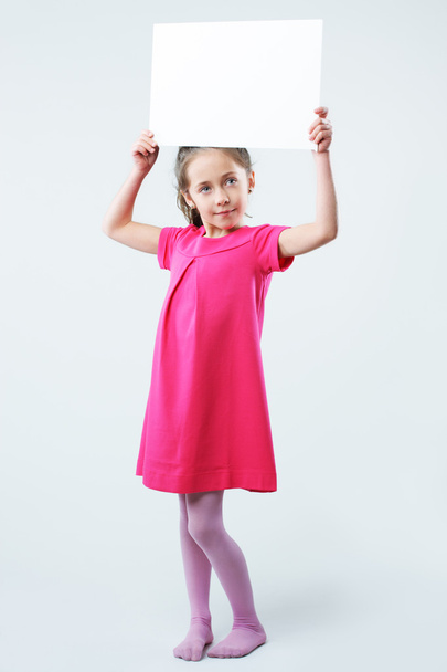 Little girl holding blank signs - Фото, зображення