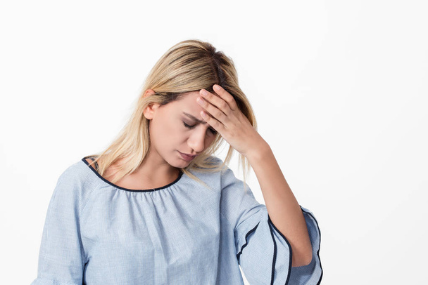 Young woman has headache isolated on white background - Zdjęcie, obraz