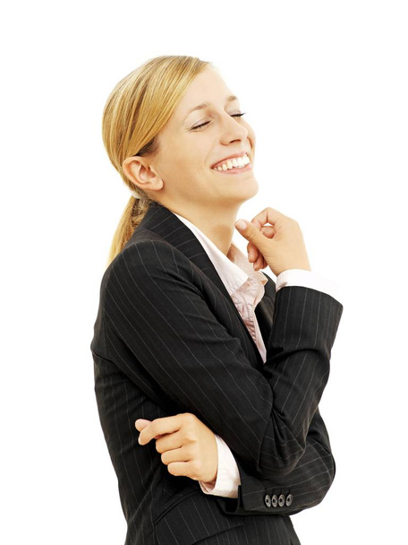 blonde Caucasian woman laughing in studio  - Foto, imagen