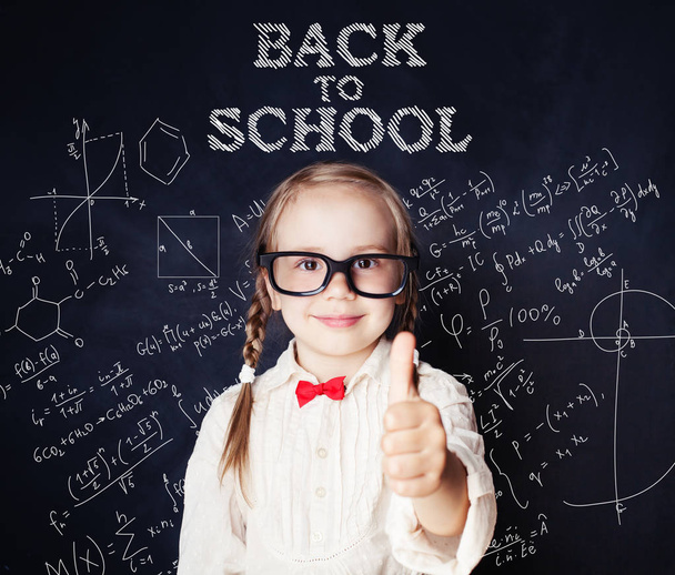 School kid thumb up. Little girl portrait, back to school - Photo, Image