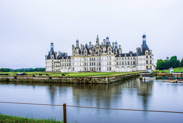 The Chateau de Chambord at Chambord, Loir-et-Cher, France, is one of the most recognisable chateaux in the world because of its very distinctive French Renaissance architecture which blends - Photo, Image