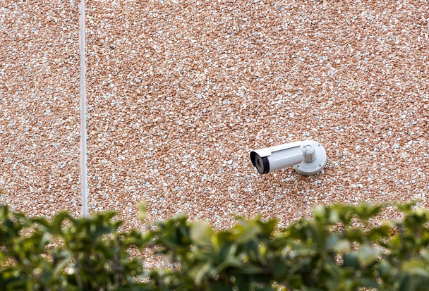 Outdoor bullet CCTV camera on the wall, space for text. Concept - technology and security - Фото, зображення