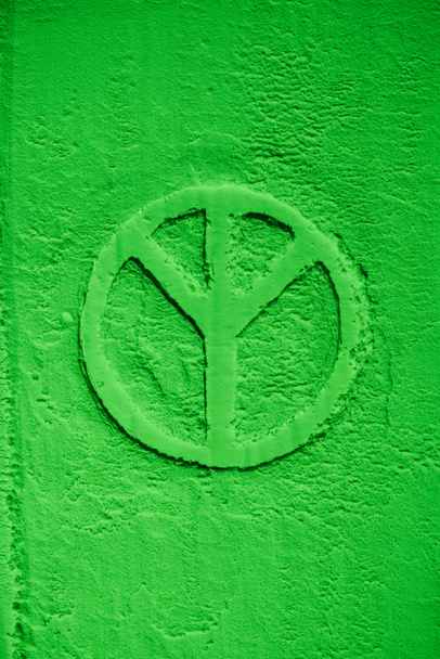 top view of greenpeace symbol in green flour - Valokuva, kuva