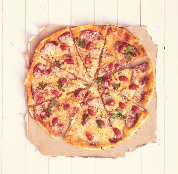 delicious cooked pizza top view - Foto, Imagem