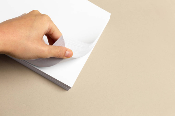 Blank paper on wood table - Foto, imagen