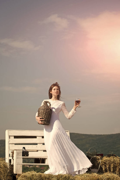 Girl in white dress posing on blue sky - Foto, Imagen