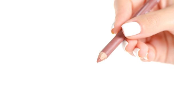 Μολύβι στο χέρι για τα χείλη - Φωτογραφία, εικόνα