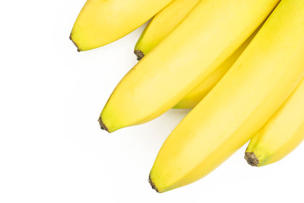 Group of six whole fresh yellow banana one cluster flatlay isolated on white background - Photo, Image