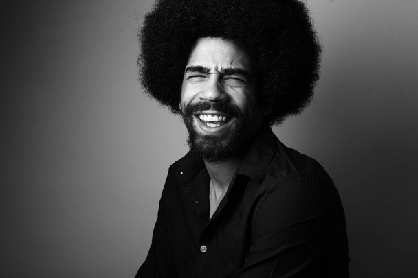 Happy black man on black and white thone - Valokuva, kuva