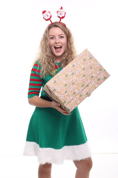 Blonde girl with Christmas gift - Valokuva, kuva