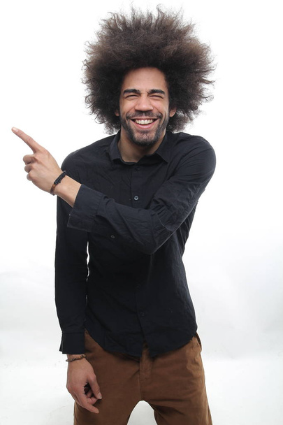 Happy black man posing on white background - Photo, image