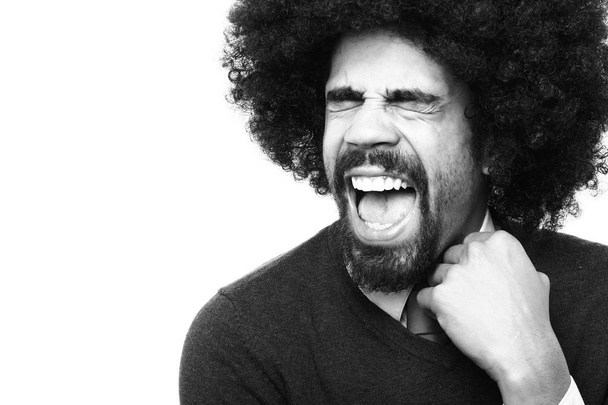 Screaming black man on black and white thone - Valokuva, kuva
