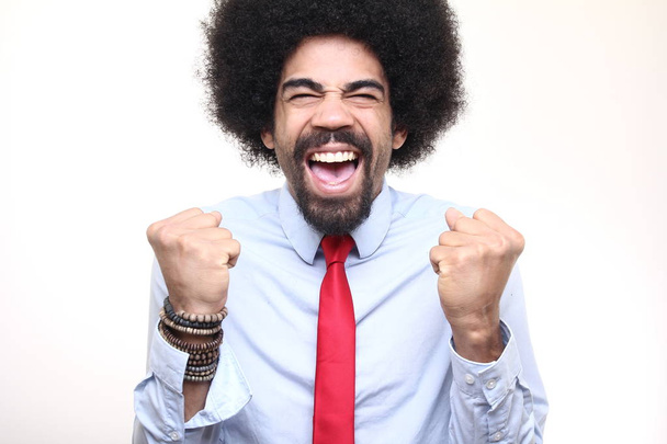 Screaming black man on white background - Фото, зображення