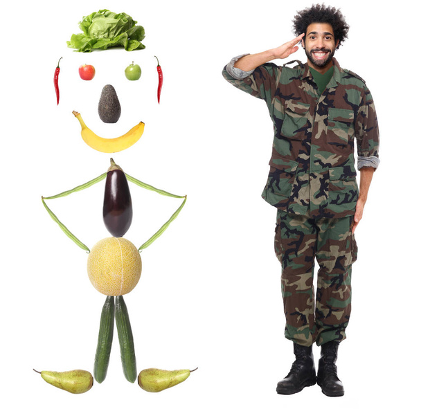 Human from vegetables and fruits with afro-american soldier - Zdjęcie, obraz