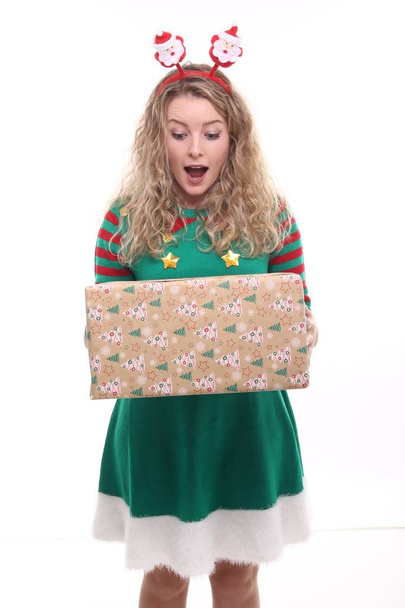 Blonde girl with Christmas gift - Photo, image