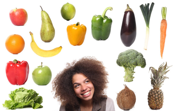 Set of different fruits and vegetables with afro-american woman - Foto, immagini