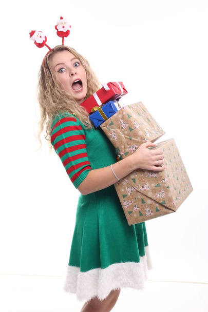 Chica rubia con cajas de Navidad
 - Foto, imagen