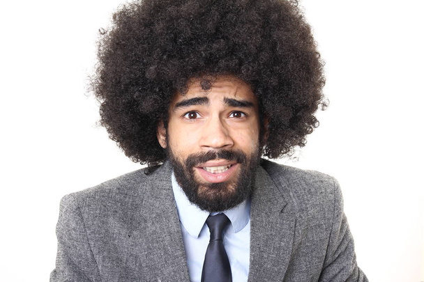 Surprised black man on white background - Fotó, kép