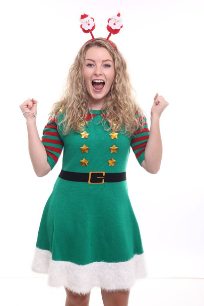 Screaming blonde girl in Christmas dress - Foto, Imagem