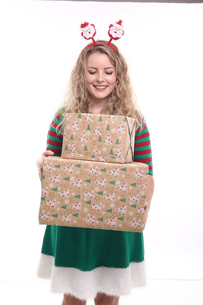Blonde girl with Christmas boxes - Foto, Imagem