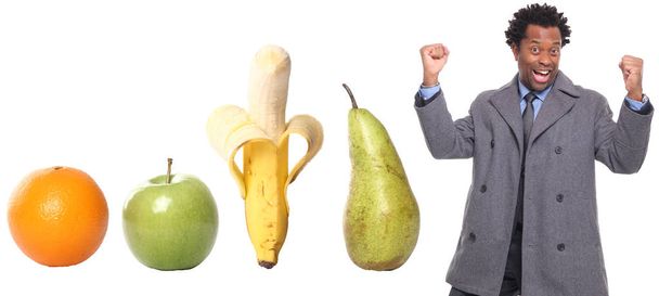 Set of different fruits with afro-american man - Φωτογραφία, εικόνα