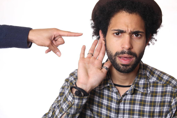 Black man listening something with another hand - Photo, Image