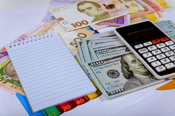 Money set multicurrency background of the us dollars and ukrainian hryvnias - Foto, Bild