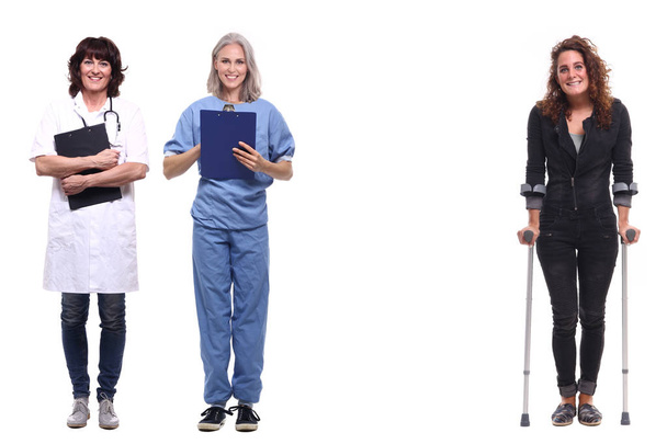 Doctors and disabled person on white background - Φωτογραφία, εικόνα
