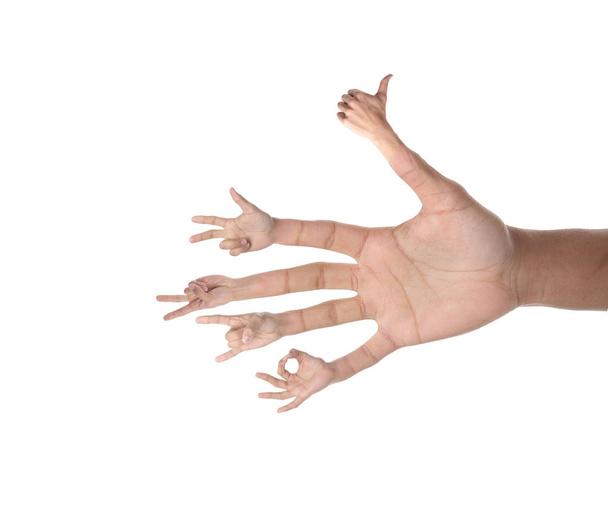 Маленькі руки зі знаками на великій руці
 - Фото, зображення