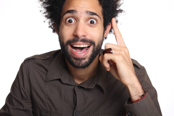 Surprised black man on white background  - Foto, Bild