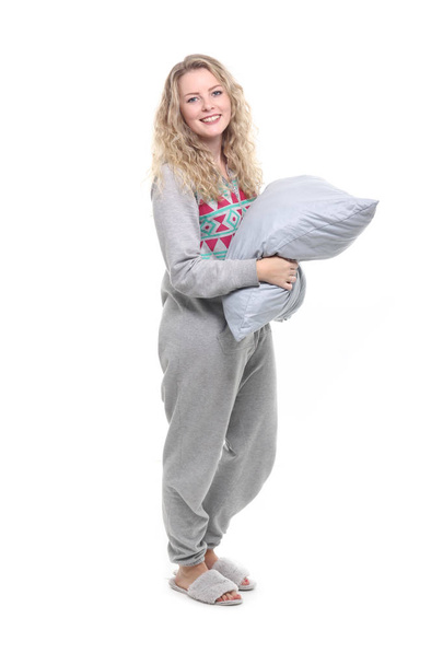 Happy blonde girl in pajamas with pillow - Фото, изображение
