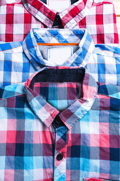 shirts plaid in plan with wooden background - Фото, зображення